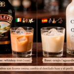 Comparativa visual entre Baileys Irish Cream y crema de orujo: dos vasos con hielo frente a sus botellas, con etiquetas que indican la base de cada licor (whiskey vs orujo/aguardiente).